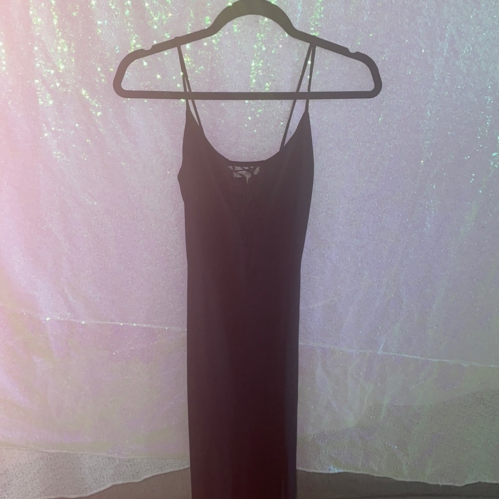 Never worn Super cute, black slit, laced middle dress.